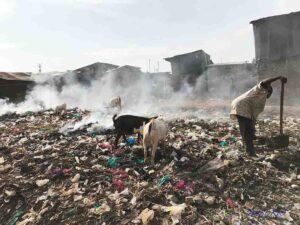 Garbage Man - Kampala Slum_Brigit_Koch_s